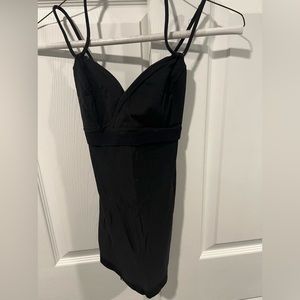 Lulu lemon womens strappy black workout top. Size 4.